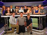 Students on the set of “OMG! Insider” with hosts Thea Andrews and Kevin Frazier. Andrews and Frazier taped shout-outs to put on Canton Community Television promoting the Student Station.