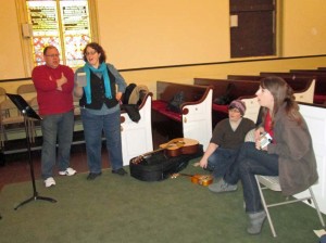 Don Seaman, Elizabeth Cole Sheehan, Lindsey Seaman, and Willow Jayne Anderson rehearse “Hallelujah.”