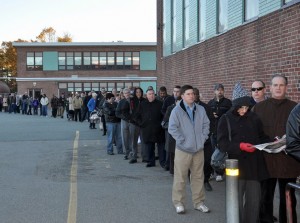 Voters line up at the JFK School on Election Day in 2012.
