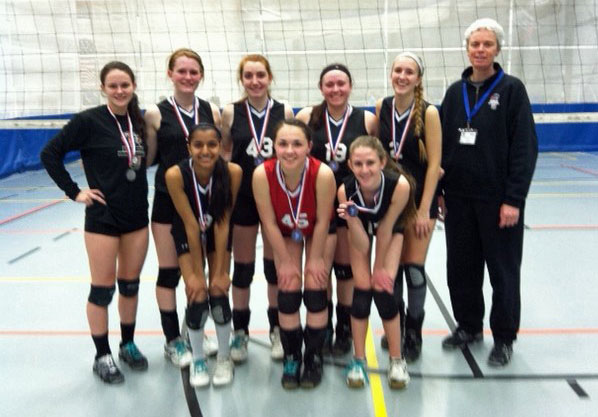 Members of the Cobra U18 team pose with their tournament medals.