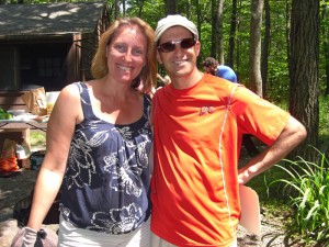 Friends of the Blue Hills President Hilary Blocker of Canton and Greg Woolf of Easton pitch in during last year’s ‘Green Up’ event.