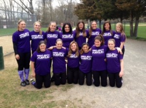 The CHS softball team wearing their Project Purple shirts