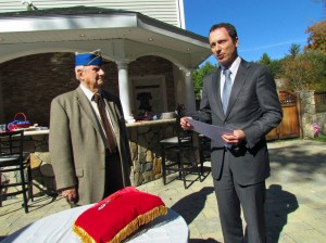 Ed Estey accepts the Legion of Honor medal from the French consul general.