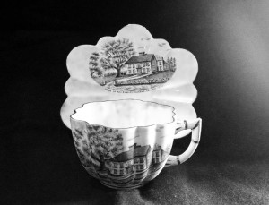 A china cup and saucer depicting the home of Parson Dunbar (Courtesy of the Canton Historical Society)