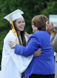 School Committee Chairman Cindy Thomas hugs her daughter, Katie. (Mike Barucci photo)