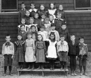 Canton’s youth, shown here circa 1894 outside the new Ponkapoag School, were beneficiaries of the largess of the growing community. (Courtesy of the Canton Historical Society)