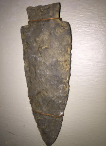 A large Normanskill-type stone spear or knife point from the Late Archaic period, approximately 3,000-5,000 years old, in the collection of the Canton Historical Society