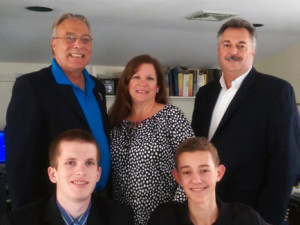 (Front row, l-r) Jared McMullen and Michael Noone; (back row, l-r) Joel Pratt, Carol and Paul Dooley