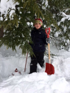 Canton's Ryan Kelleher does his part to dig out a fire hydrant.