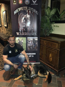 Staff Sgt. Estabrook with his new service dog, Freedom