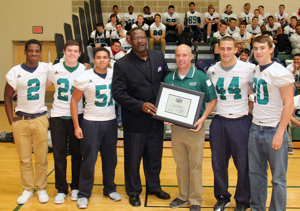 Patriots legend Andre Tippett presents the Coach of the Week award to Dave Bohane, who is flanked by his captains: Woanyen Mahn, Mike McMahon, Mack Brown, Joe Bires and Jake Ragusa.