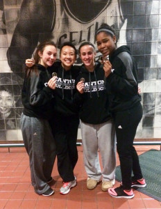 L-R: Nicole Brown, Selena Cho, Hannah Link and Tanya Bastien with their 2nd place medals at the D4 state relays