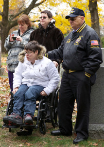 Jeanne Quinn (center) and daughter Yvonne are overcome with emotion at a memorial ceremony for Shaun at St. Mary's Cemetery in 2012. (Tanya Willow photo)