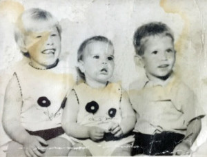 Caroline Christian (center), pictured above with her siblings, was only 2 years old when her father was murdered.