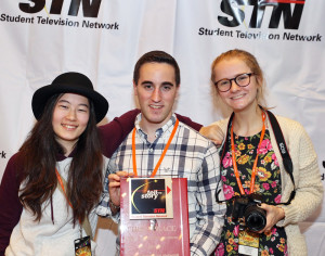 L-R: Mia Tess, Jason Kaplan, and Roni Polsgrove accept their award at the Student Television Network Convention.