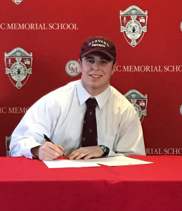 Jack McGowan of Canton signs his National Letter of Intent to play football at Harvard beginning next fall.