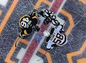 Rooney faces off against David Krejci of the Boston Bruins at the TD Garden on March 4.