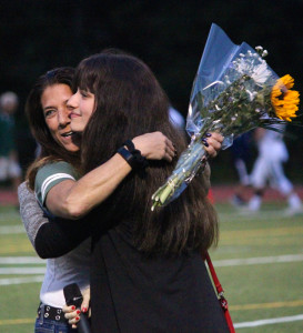 Rosey Cravens and her niece Jamie Piro after the national anthem (Mike Barucci photo)