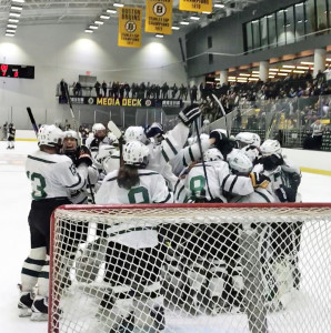 The CHS girls hockey team celebrates after their semifinal win vs. Archbishop Williams. (Tim O'Connor photo)