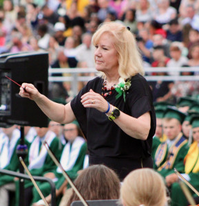 Jen Henderson conducts the CHS orchestra during the recent graduation ceremony. (Mike Barucci photo)