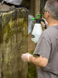 Stephen Badessa came from Quincy to help clean stones in his hometown. (George Comeau photo)