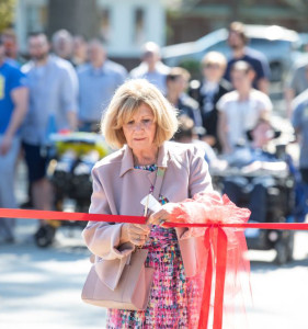 June Martin cuts the ribbon at the dedication of the new playground named in her late husband's honor. (Photo courtesy of PRHC)